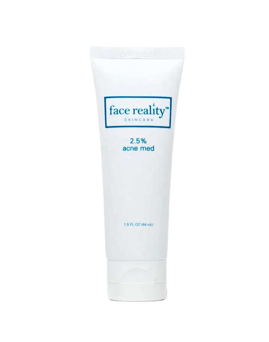 A tube of Face Reality Acne Med 2.5% cream for acne treatment.